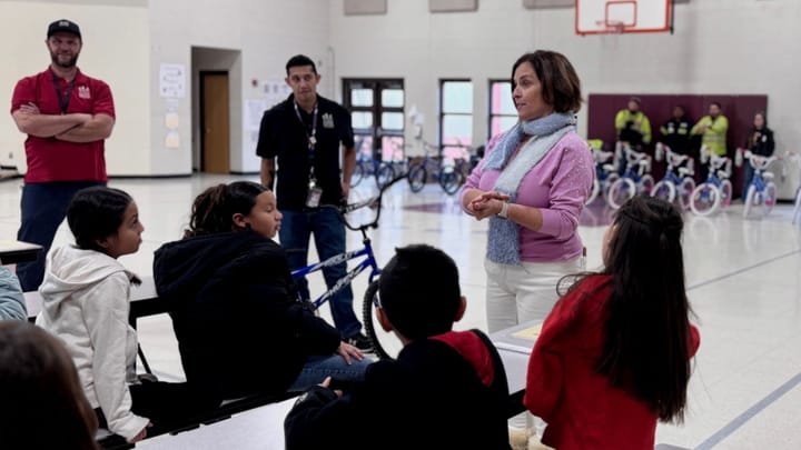 Holiday cheer rolls through LCPS with bicycle giveaway